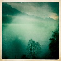 Swiss Alps Train Ride A lake in the Swiss Alps between Lucerne and Interlaken.